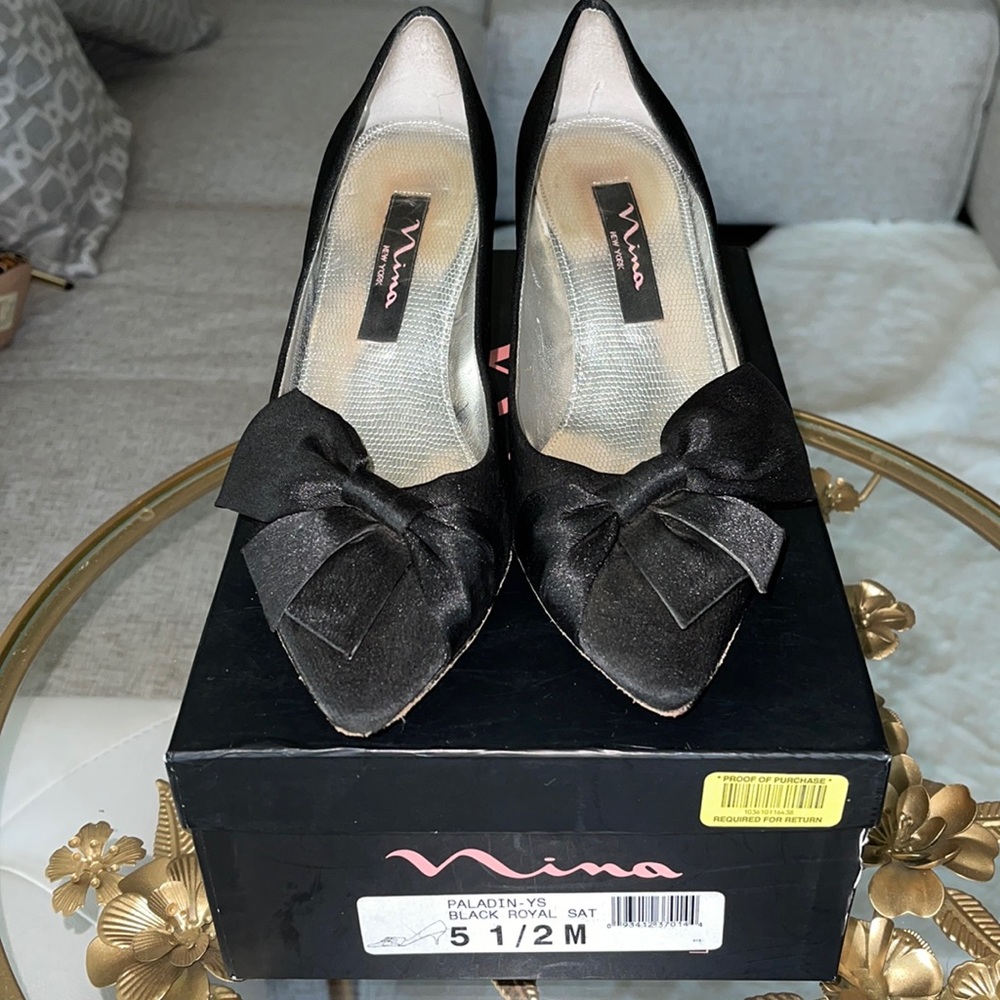 Nina pointy toe satin bow pumps.